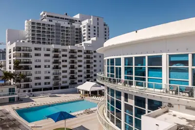 an aerial view of a building with a swimming pool at Shine Suites Studio 8 in Miami Beach