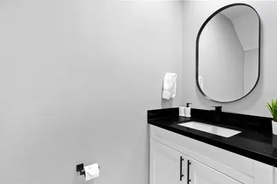 a bathroom with a black sink and a mirror at Family-Friendly Apt in Miami - Sleeps 4, Near Everything in Miami