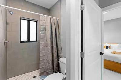 a bathroom with a shower and a toilet at Family-Friendly Apt in Miami - Sleeps 4, Near Everything in Miami