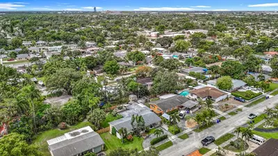 an aerial view of a city with houses and trees at Boho Oasis -World Cup base- under 20 min to stadium & FLL airport in Fort Lauderdale