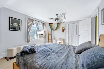 a bedroom with a bed and a ceiling fan at Casa Alaïa West Brickell Sleeps 20 Pool&Spa in Miami