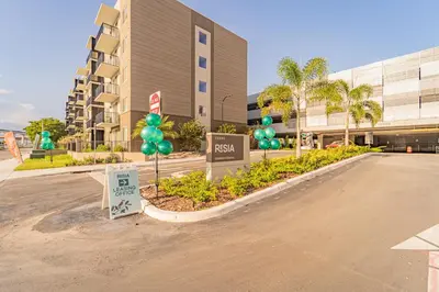 a parking lot in front of a building at Devereaux Miami Luxury 2 Bedroom Apartment in Biscayne Gardens