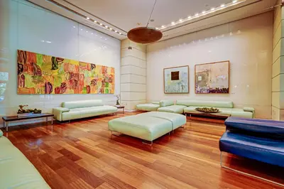 a large living room with couches and a painting at Cozy Grove Stay Free Parking Pool Access Walk to Cafes and Parks in Miami