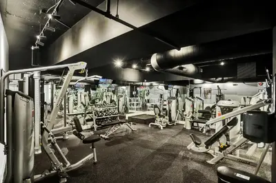 a gym with a lot of equipment in it at Bright Beachside 4 Bedrooms 2 Bathrooms Condo Pools Gym and Sauna Access 616 in Miami Beach
