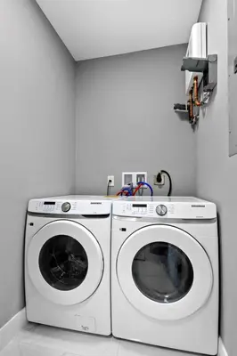 a laundry room with a washer and dryer at Comfortable Townhouse - Free Parking Included in Miami