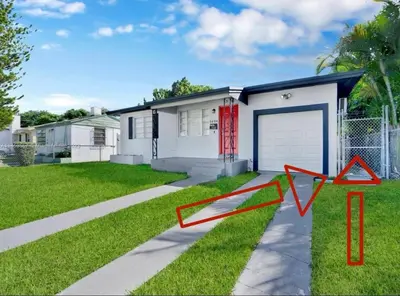 a house with two red arrows in front of it at HOT TUB and Washer & Dryer in Unit in Miami