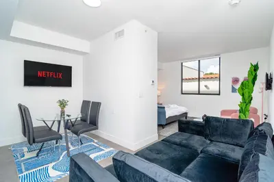 a living room with a couch and a table at MetroPark Hotel in Miami