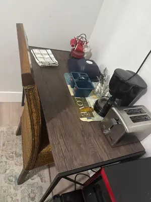 a wooden table with a toaster on top of it at Suite in Dania Beach in Dania Beach