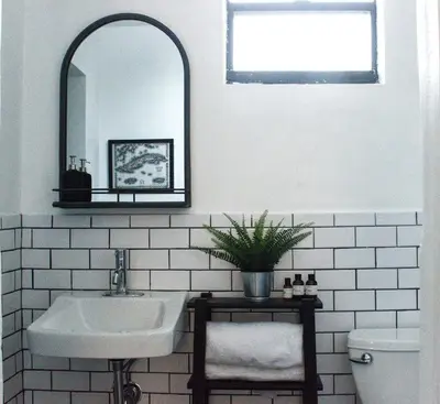 a bathroom with a sink and a mirror at The Havana Nights Guesthouse - Private Stay with Free Parking in the Heart of Miami in Miami