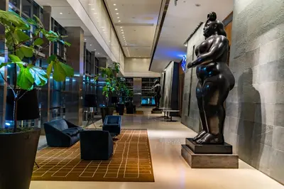 a statue in the lobby of a building at Four Seasons Miami Luxury Two-Bedroom Suite in Brickell - Free Parking in Miami