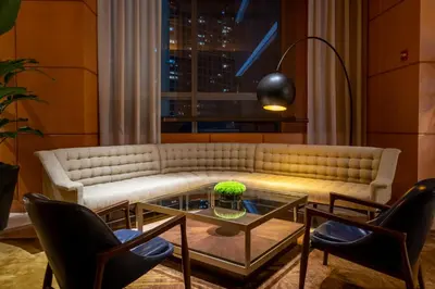 a living room with a couch and a table at Four Seasons Miami Luxury Two-Bedroom Suite in Brickell - Free Parking in Miami
