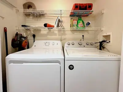 a kitchen with two white appliances and a stove at 1B - 1B Apartment for 3 at Pembroke Pines in Pembroke Pines