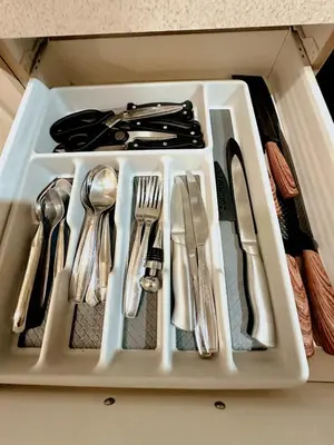 a white tray with utensils in a drawer at 1B - 1B Apartment for 3 at Pembroke Pines in Pembroke Pines