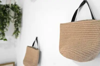 two brown bags hanging on a wall at 1834 SW 27th Ave 2 · Vibrant Miami Getaway 2 Beds Near Beach Port in Miami