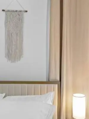 a bedroom with a bed and a lamp and a window at 1834 SW 27th Ave 2 · Vibrant Miami Getaway 2 Beds Near Beach Port in Miami