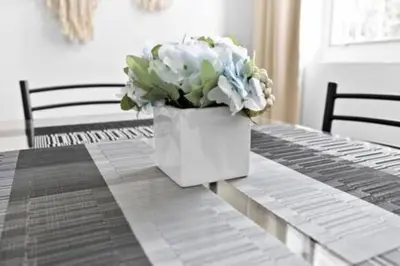a vase of flowers sitting on top of a table at 1834 SW 27th Ave 2 · Vibrant Miami Getaway 2 Beds Near Beach Port in Miami