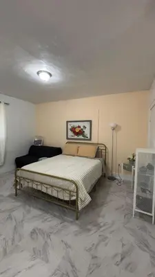 a bedroom with a bed in a room at The Studio 6 Little Havana Walk to Marlins Stadium in Miami
