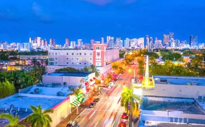 a city street with a city skyline in the background at Miami Vibes in Miami