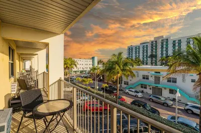 a balcony with a view of a city at Amazing 1bed on Hollywood Beach Boardwalk W Pool in Hollywood