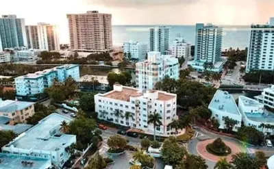 an aerial view of a city with tall buildings at Tropical South Beach Condo - Pool & Miami Beach Vibes in Miami Beach