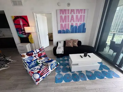 a living room with a couch and a coffee table at Spectacular corner 2BDR Downtown Miami in Miami