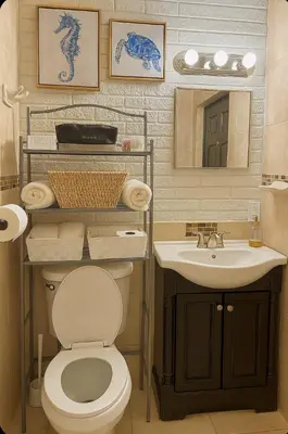 a bathroom with a toilet and a sink at 4bdrm Waterfront salt water Pool home with Outdoor theater Game Rm Make up vanities in every room Perfect for Game days and concerts trips to Miami Hard rock stadium and hotel 15 mins away in Miramar