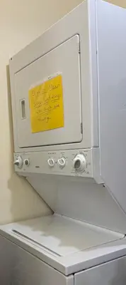 a yellow sticky note on the door of a refrigerator at 4bdrm Waterfront salt water Pool home with Outdoor theater Game Rm Make up vanities in every room Perfect for Game days and concerts trips to Miami Hard rock stadium and hotel 15 mins away in Miramar