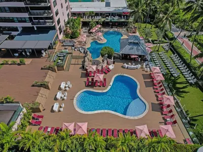 an aerial view of a resort with two swimming pools at Oceanside Paradise Escape Spacious and Scenic Resort amenities Pools Bar Sauna 1514 in Miami Beach