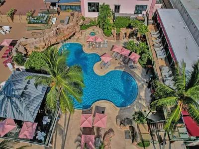 an aerial view of a pool at a resort at Modern Beach Retreat 2BR and 2BA Pools, Sauna, Gym Oceanfront Building 1615 in Miami Beach