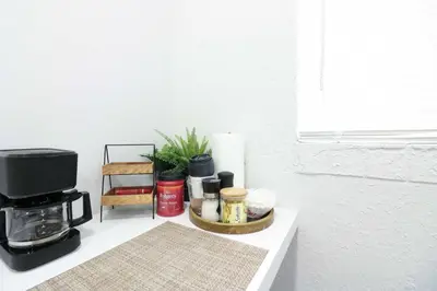 a counter top with a coffee maker and a coffee pot at Modern 3 BR Villa Near Beach & FLL in Hollywood