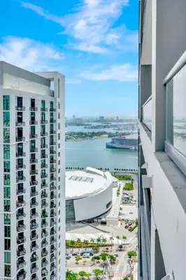 a view from the balcony of a building at 40th floor lux condo with pool, gym and spa access in Miami