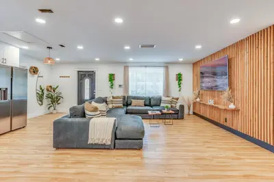 a living room with two couches and a kitchen at Fox Garden Luxury Boho Near Downtown & Beach in Fort Lauderdale