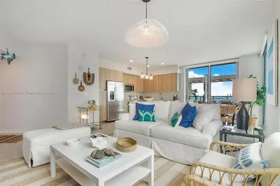 a living room with a couch and a table at Luxury Penthouse Water Views Massive Terrace in Miami
