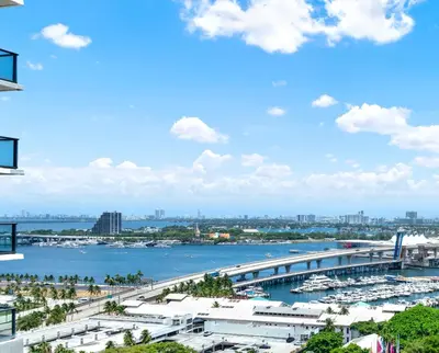 a view of a harbor with boats in the water at Ocean Front Condo Near Cruise Port, Bayfront Park, plus Free Parking in Miami