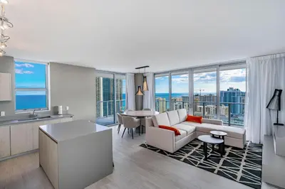 a kitchen and living room with a view of the city at Miami Escape 16th Floor – Near Hollywood Beach in Hollywood