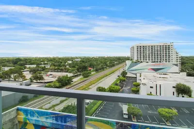 a view of a city from the balcony of a building at Luxury 1BR in Quadro Miami with Pool and Parking in Miami