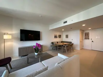 a living room with a couch and a table at Downtown Miami view - 38th floor gem in Miami