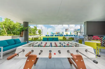 a room with a foosball game on a table at Amazing 3Beds 3Baths Corner Unit Downtown Miami in Miami