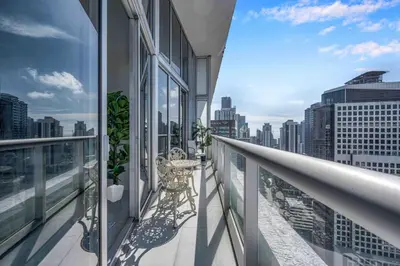 a balcony with a view of a city skyline at 40th floor High Ceilings unit at icon brickell in Miami