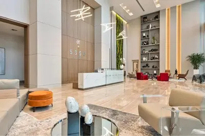a lobby with couches and a table in a building at Stylish 3BD-3BR at the Heart of Downtown Doral with Top Amenities & Golf in Miami
