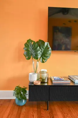 a table with a potted plant and books on it at Stylish 2br apt, king-size bed, 5mins to the beach - J3 in Hollywood