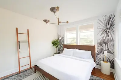 a bedroom with a white bed and a window at Stylish 2br apt, king-size bed, 5mins to the beach - J3 in Hollywood