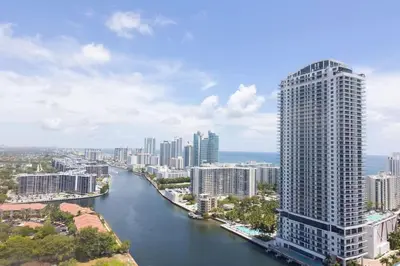 a view of a city with a river and buildings at Beachwalk -1 Bedroom W-Kitchen and Epic Views in Hallandale Beach