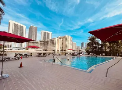a swimming pool in the middle of a city at Beachwalk -1 Bedroom W-Kitchen and Epic Views in Hallandale Beach