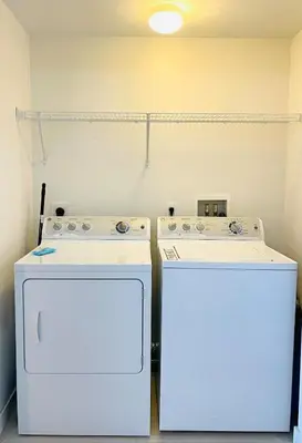 a kitchen with two white appliances in a room at Beachwalk -1 Bedroom W-Kitchen and Epic Views in Hallandale Beach
