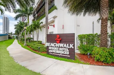 a sign on the side of a building at Epic 29th-Floor Studio at Beachwalk Resort in Hallandale Beach