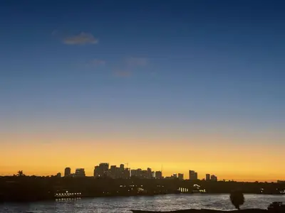 a view of a city skyline at sunset at Champagne at Tiffany's - Luxury Condo by the Beach in Fort Lauderdale