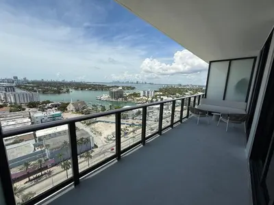 a balcony with a view of the water and a city at New 1Bed 1 bath Ocean view in Miami Beach