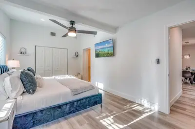 a bedroom with a bed and a ceiling fan at Fox Private Resort- Near Downtown & Beach home in Fort Lauderdale