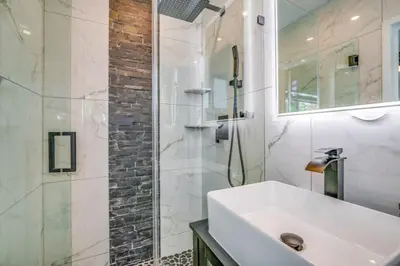 a white bathroom with a sink and a shower at Fox Private Resort- Near Downtown & Beach home in Fort Lauderdale